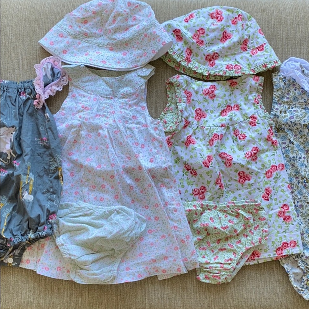 Bundle of new baby girl clothes